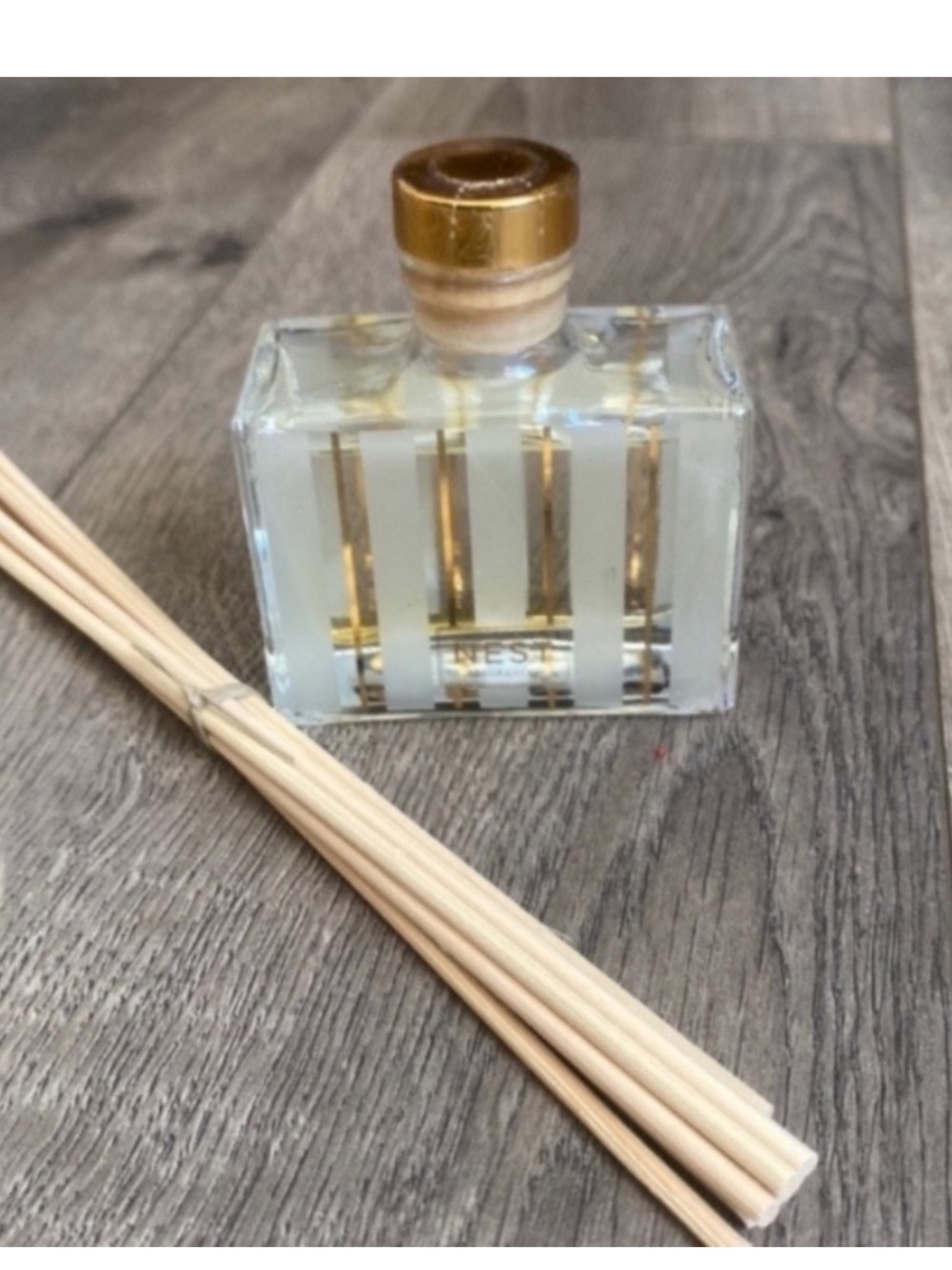 NEST Fragrances Holiday Reed Diffuser — Clear Bottle with Gold Label